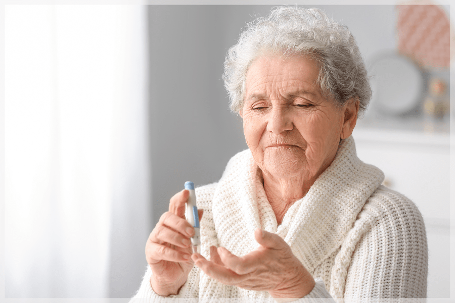 Diabetes in elderly adults Senior woman checking her blood sugar MeetCaregivers