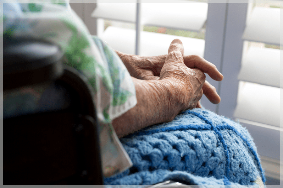 Diabetes in elderly adults - Senior woman sitting in a wheelchair indoors - MeetCaregivers