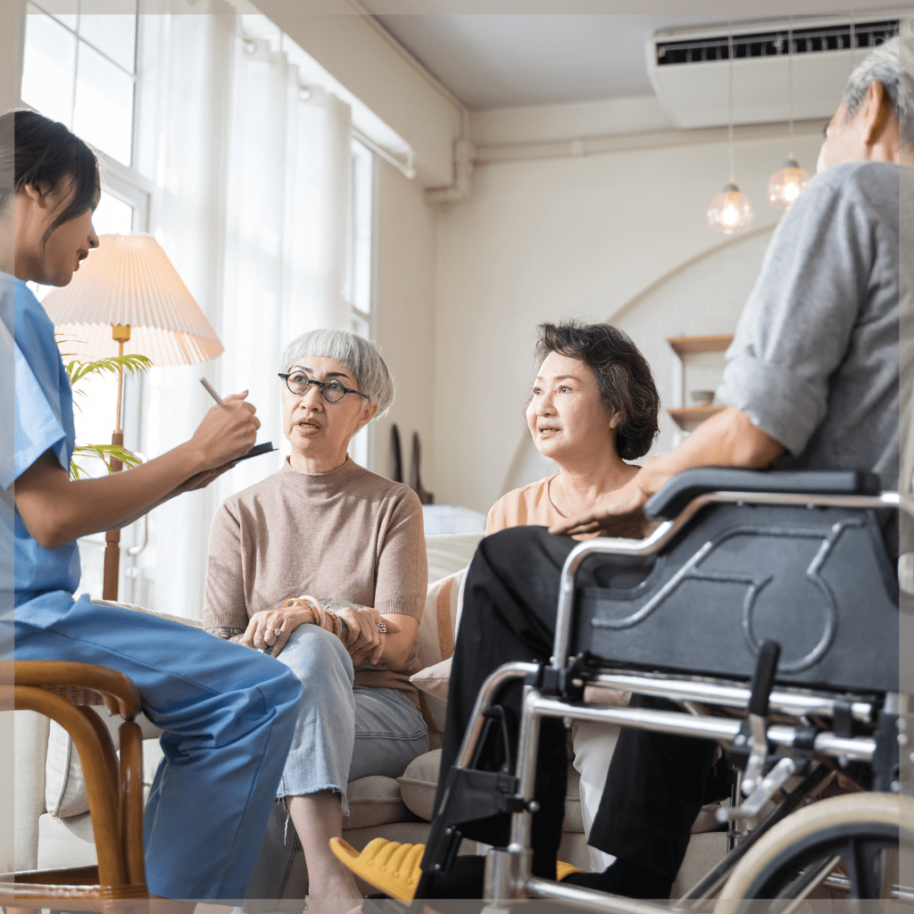 Care coordinator taking notes while talking to family - MeetCaregivers