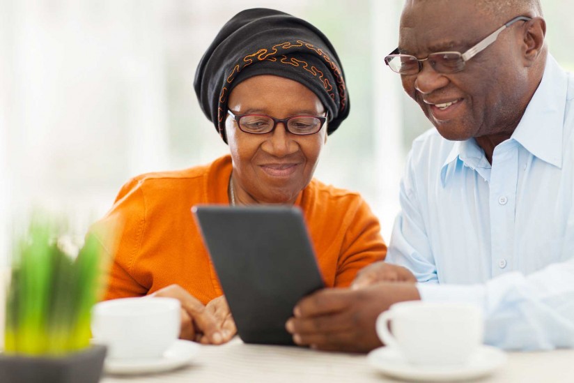 Technology For Seniors - Cute Old Couple On A Tablet