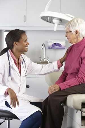 Health Literacy - Senior Woman Discussing Health With Doctor