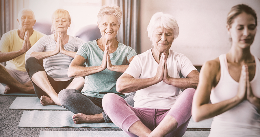 Pain Awareness Month - Older Adults Doing Yoga
