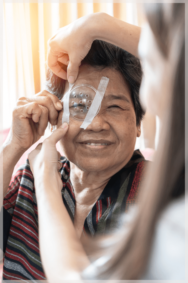 Elderly woman receiving eye drop treatment for glaucoma MeetCaregivers