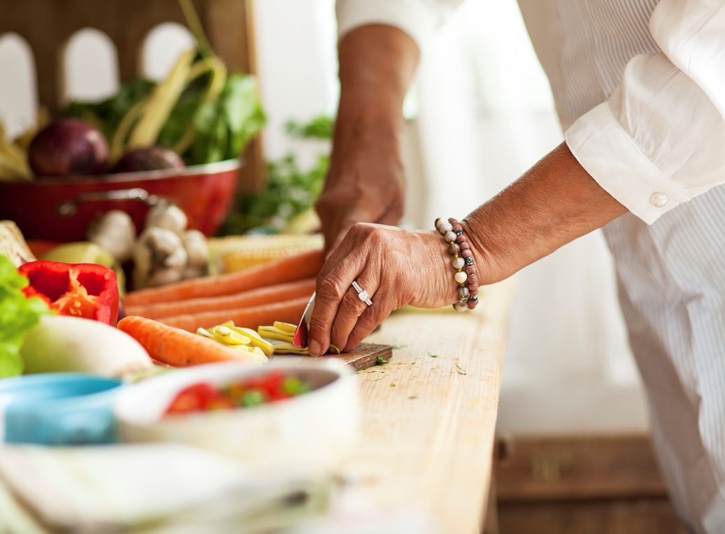 Senior Safety - An Elderly Woman Cutting Veggies
