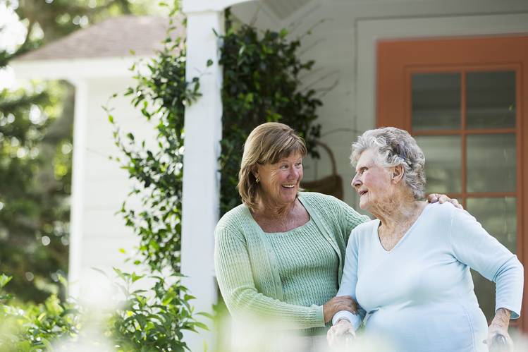 Benefits Of Caregiving - A Middle Aged Woman And Her Elderly Mother Embracing