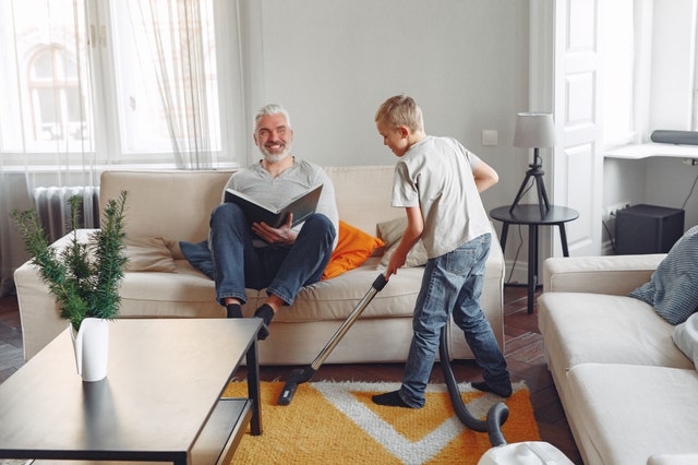 spring-cleaning-photo-of-boy-cleaning-the-carpet-3890169