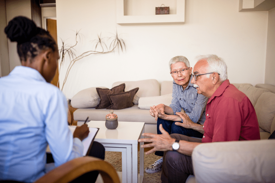 Elderly Couple Speaking To A Therapist During National Mental Health Month