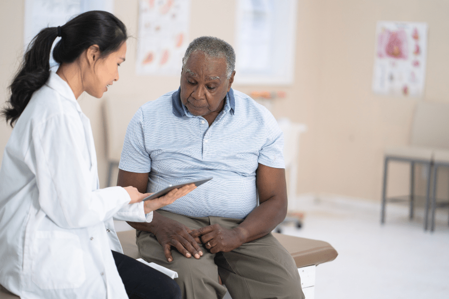 Men's Health Month – Senior Man Talking To His Doctor