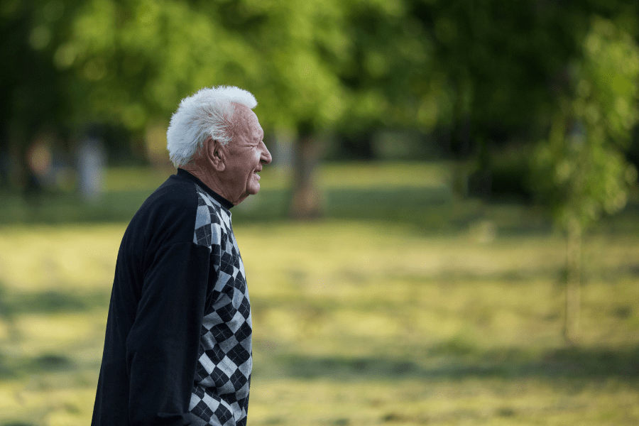 Mens Health Month– Senior Man Walking In The Park