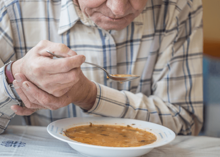 parkinsons patient eating soup