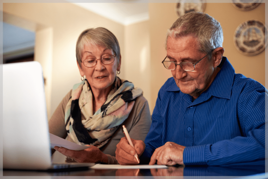 Resources for family caregivers Senior couple using a laptop and writing notes MeetCaregivers