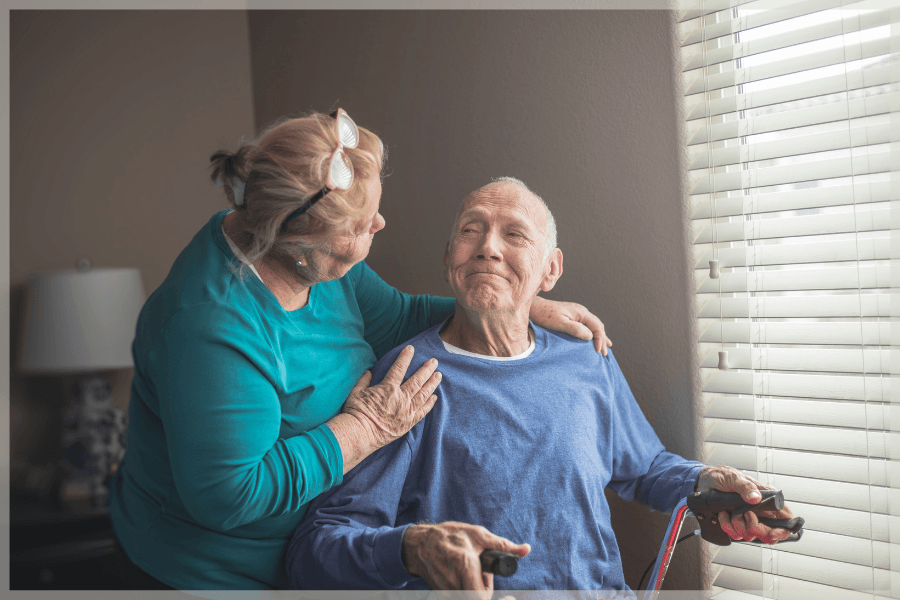 Home safety for dementia patients - Senior woman caring for her elderly wheelchair bound husband - MeetCaregivers