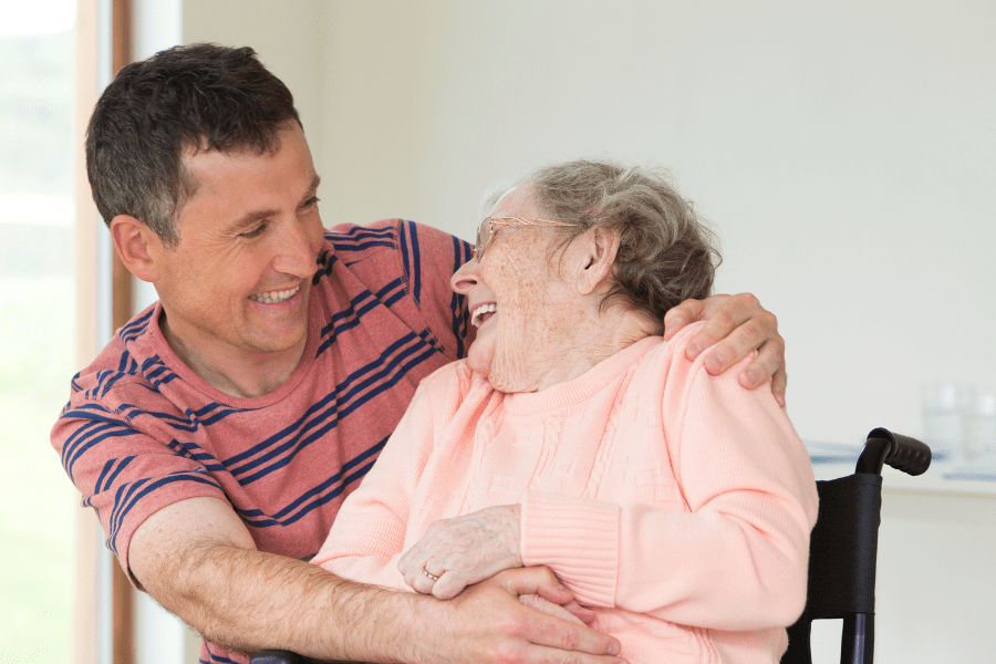 compassion-fatigue-adult-son-hugging-his-elderly-mother