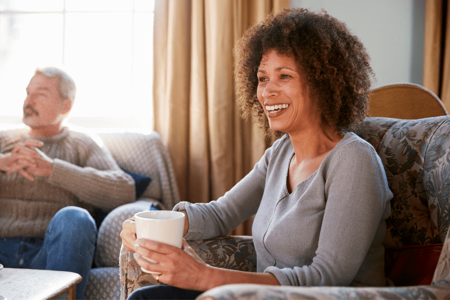 compassion-fatigue-middle-aged-woman-chatting-with-friends-at-home