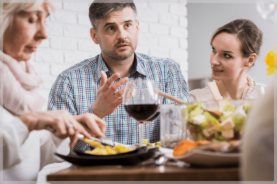 Family tensions at the dinner table due to holiday stress - MeetCaregivers