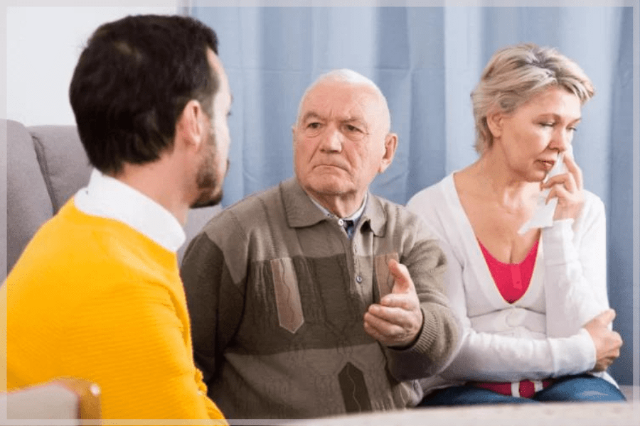 Caring for aging parents – Adult children having heated discussion with elderly father – MeetCaregivers