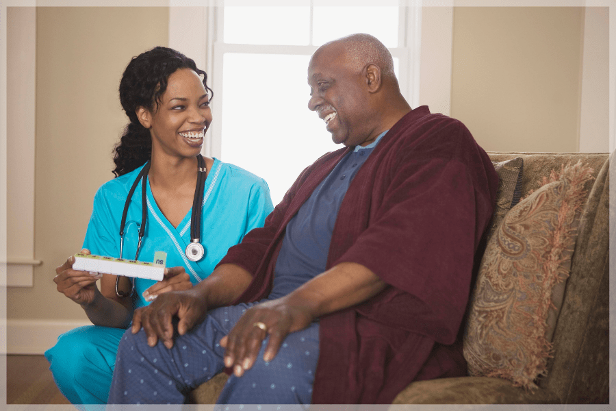 Senior resources - Nurse administering medication to a patient - MeetCaregivers