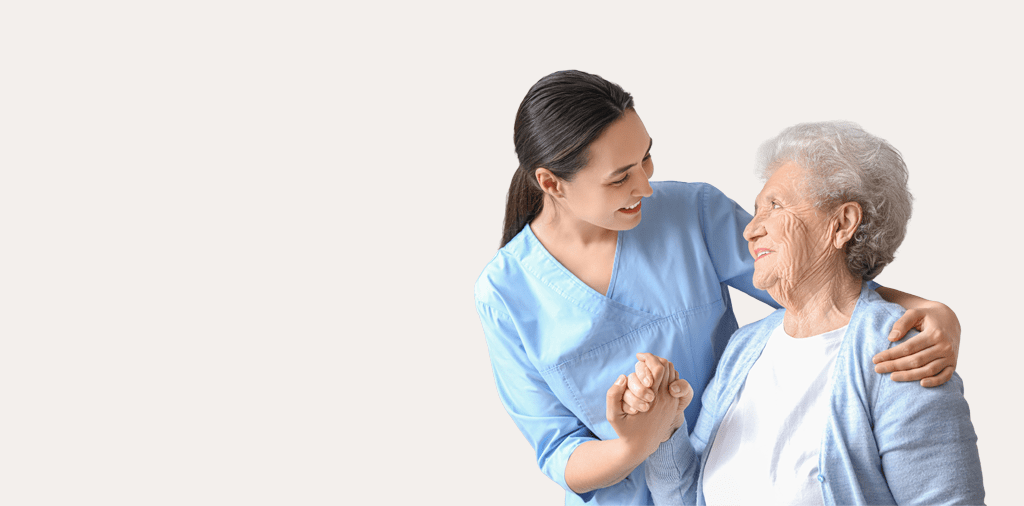 Caregiver helping senior woman