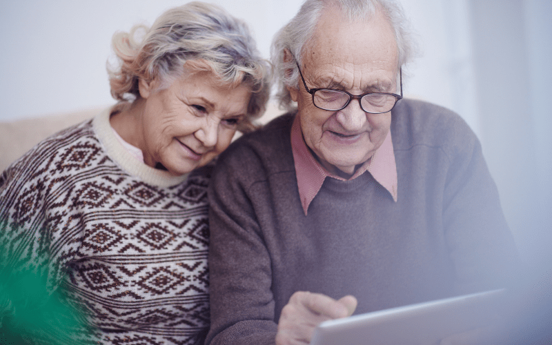 older-couple-planning-an-advance-directive-on-their-tablet